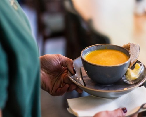 A light dinner setting with a bowl of soup
